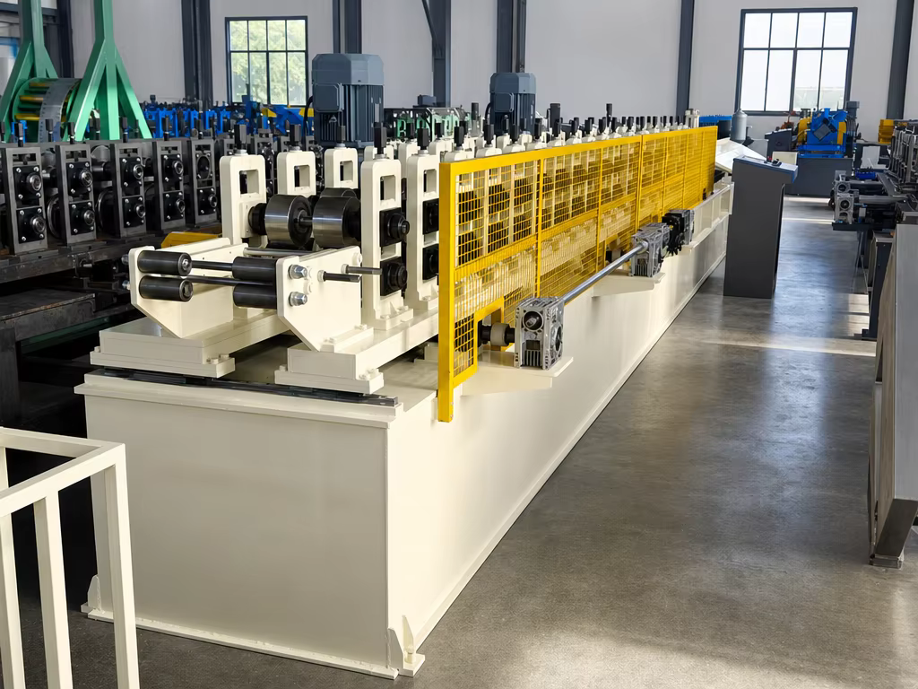 Gutter guard forming line installed in a workshop with yellow safety guard
